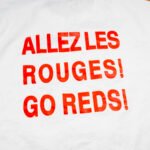 "Allez Les Rouges! Go Reds!" — Canada Brushstroke Crest Tee