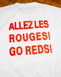 "Allez Les Rouges! Go Reds!" — Canada Brushstroke Crest Tee